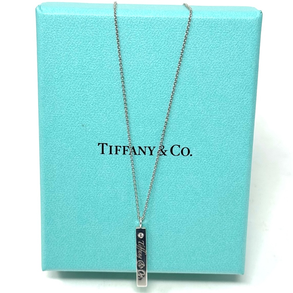 Authentic Tiffany & Co. 1P Note Engraved Bar Necklace.